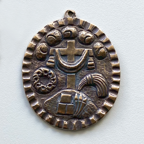 759 ORNAMENT, MEDAL, MILAGRO. Pacha Mama: To the Land that Gives the Food, 1-3/4"