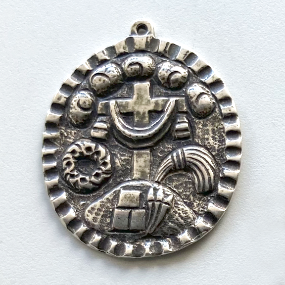 759 ORNAMENT, MEDAL, MILAGRO. Pacha Mama: To the Land that Gives the Food, 1-3/4"